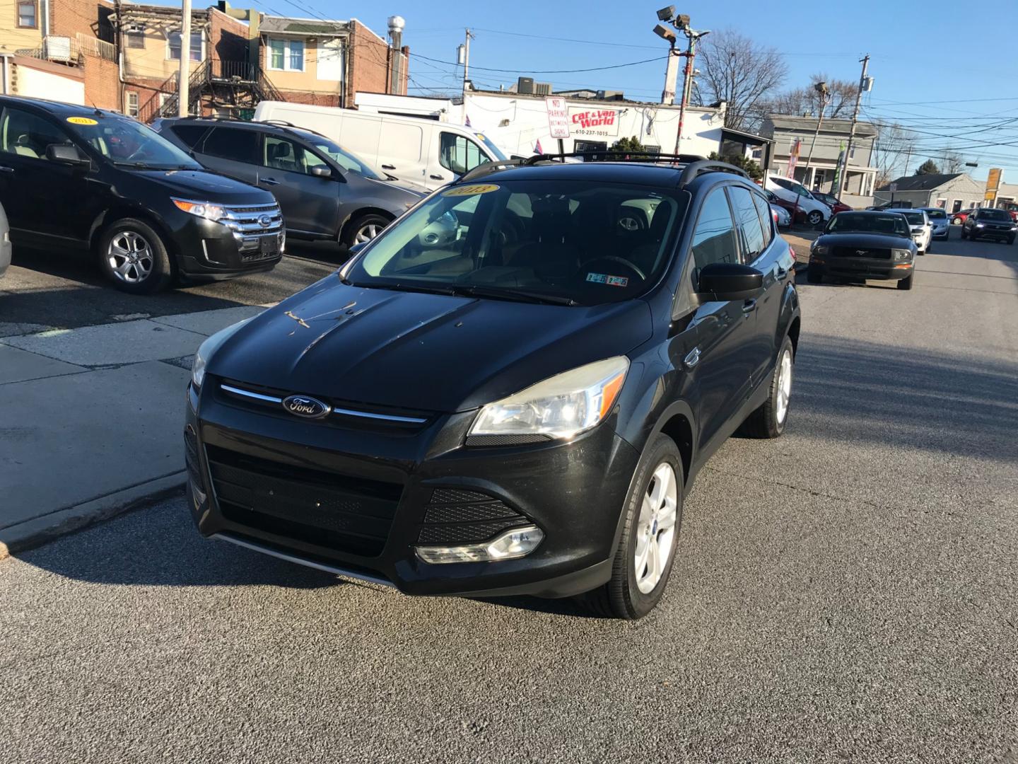 2013 Black /Black Ford Escape SE (1FMCU9G93DU) with an 2.0 V4 engine, Automatic transmission, located at 577 Chester Pike, Prospect Park, PA, 19076, (610) 237-1015, 39.886154, -75.302338 - Photo#2